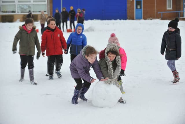 Seaburn Dene Primary School pupils have fun in the snow, after the school reopened thanks to the efforts of staff and parents.