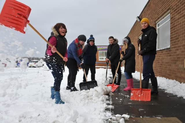 Seaburn Dene Primary School teachers helped clear snow so the school could reopen.
