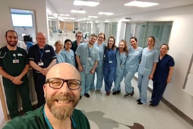 Dr Mark Carpenter and other members of the ICCU team who made it in during tough weather conditions in a photo he tweeted to followers.