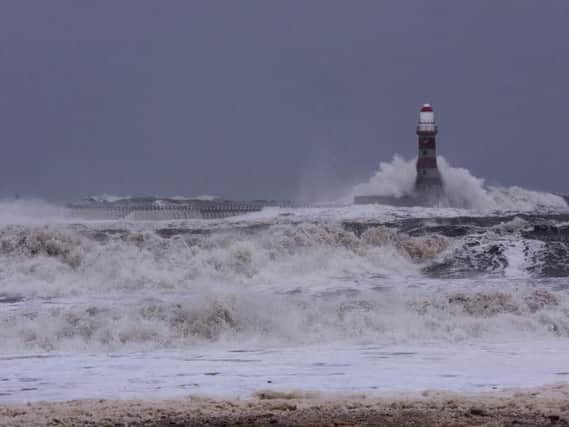 Roker Pier taking a battering in the storms.