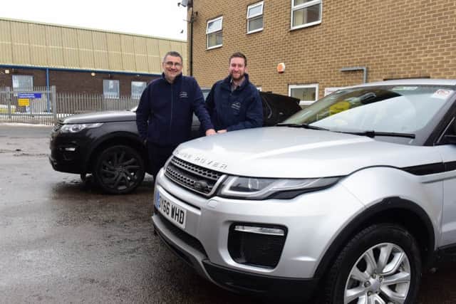 Shaun Parkin, left, deputy porter and security manager, and Mark Turner, portering and security manager, turned to driving 4x4s to help staff during the bad weather.