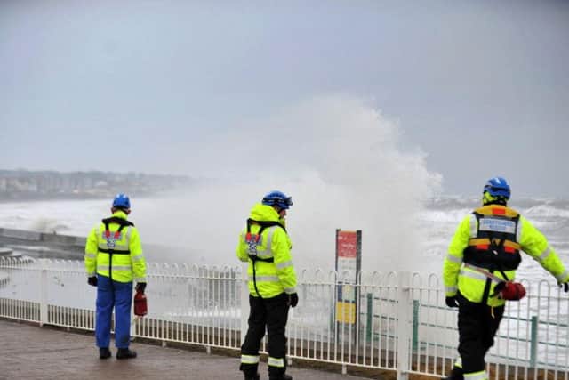 Members of Sunderland Coast Guard Rescue on the seafront at Roker.