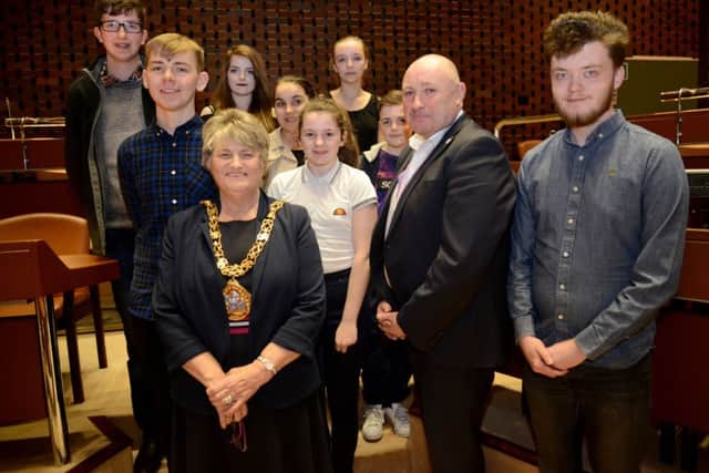 Joshua McKeith and Dane Bainbridge (far left and second from left) with the Mayor of Sunderland, Coun Doris MacKnight,  Simon Marshall from Together for Children and members of Sunderland Youth Parliament.