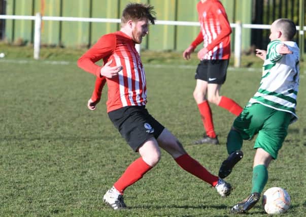 Silksworth CW (red/white) take on Cleator Moor Celtic recently. Picture by Kevin Brady