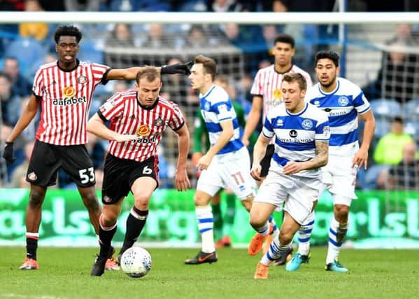 Lee Cattermole tries to get forward for Sunderland at QPR, as Ovie Ejaria looks on. Picture by Frank Reid