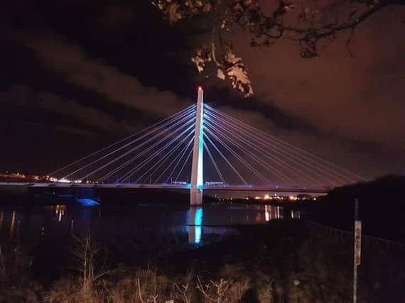Testing the lights on the Northern Spire this evening. Picture: Jamie Lister