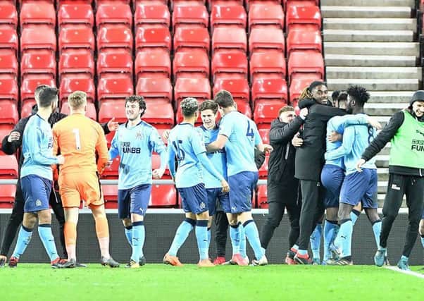 Keeper Paul Woolston joins his Newcastle U23 team-mates to celebrate knocking out Sunderland last night. Picture by Frank Reid