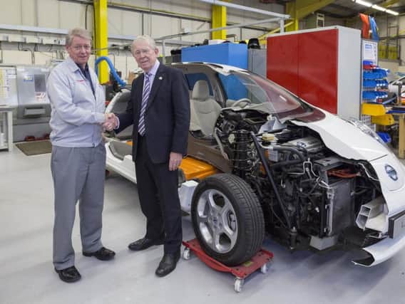 Kevin Fitzpatrick, Nissan Europe divisional vice president for manufacturing and Councillor Harry Trueman, leader of Sunderland City Council with the Nissan half-LEAF
