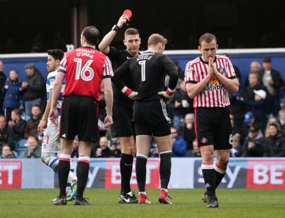 Sunderland goalkeeper Jason Steele is shown the red card by the referee during the Sky Bet Championship match at Loftus Road, London. Picture by PA