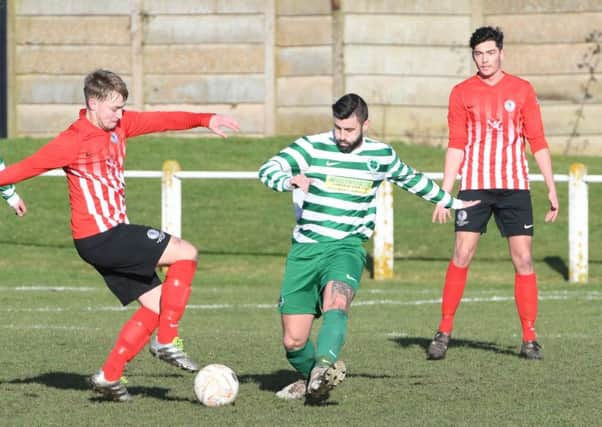 Silksworth CW (red/white) take on Cleator Moor Celtic last month
