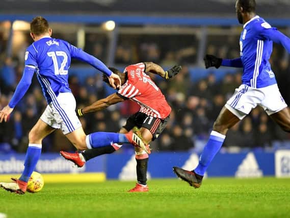Kazenga LuaLua shoots at goal in the defeat to Birmingham City.