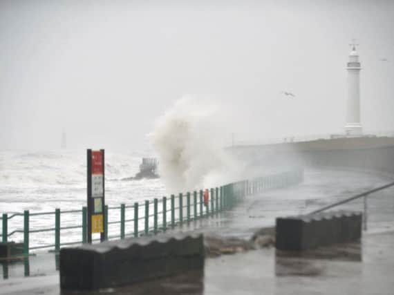 Waves batter the Sunderland seafront today