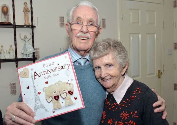 Norman and Dorothy Colling celebrate their Diamond Wedding anniversary.