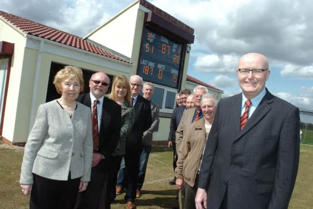 Seaham Harbour Cricket Club chairman John Blackford (right) at the unveiling of the New Drive scoreboard in 2013.