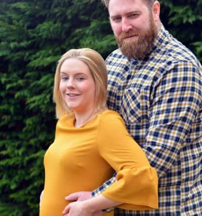 Ashleigh Powell and Steve Taylor lit up Sunderland Empire blue for their pregnancy gender