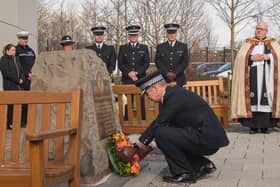 Temporary Chief Constable Winton Keenen lays a wreath in memory of Sergeant Bill Forth, the Sunderland police officer who was killed on duty 25 years ago today. Pic: Northumbria Pollce.