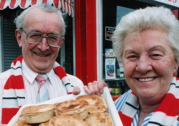 Victor and Jean Outram outside their pie shop in Roker.