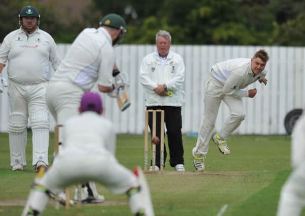 Seaham Harbour bowler Jack Lacey powers in against Boldon last summer.