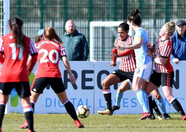 Victoria Williams pounces to open the scoring for Sunderland.