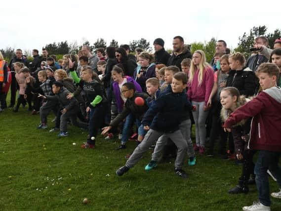 Children take part in egg rolling at last year's Penshaw Bowl event.