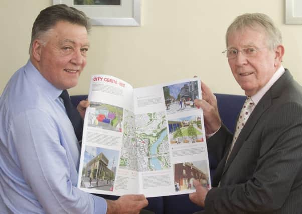 Sunderland City Council cabinet secretary Coun Mel Speding (left) and leader Coun Harry Trueman examine trhe 3, 6, 9 document