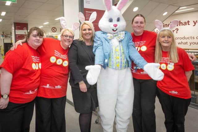 The Easter Bunny with staff at Wilko