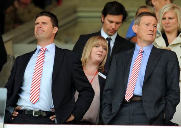Former Sunderland chairman Niall Quinn alongside the club's owner Ellis Short back in 2011. Pic by PA.