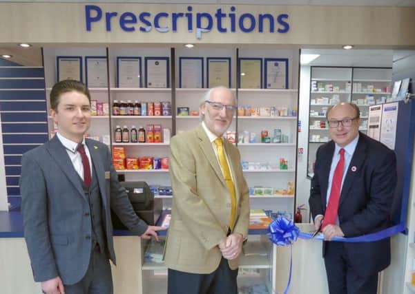Pharmacist Garry Forbes, Whitfield's managing director Peter Grundy and Easington MP Grahame Morris.