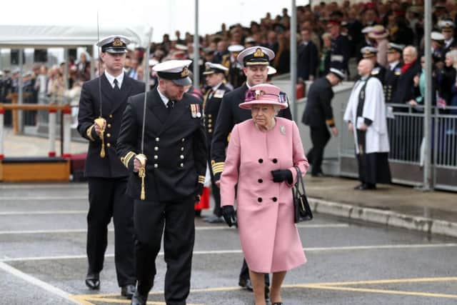 The Queen arrives for the decommissioning ceremony for HMS Ocean at Devonport in Plymouth. Pic: PA.