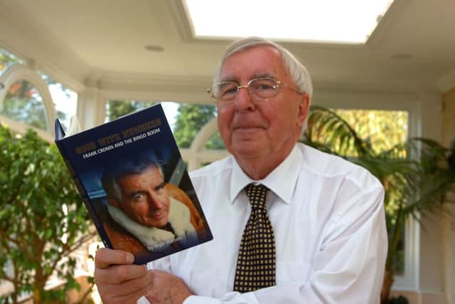 The late Frank Cronin, who led the Edward Thompson Group, pictured with his book.