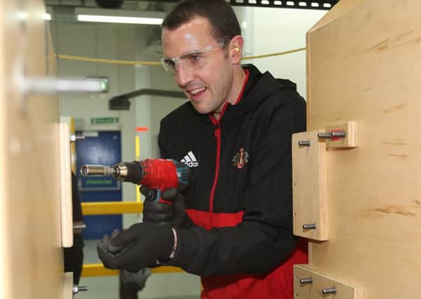 John O'Shea gets down to work at Peterlee's Caterpillar factory. Picture by Ian Horrocks