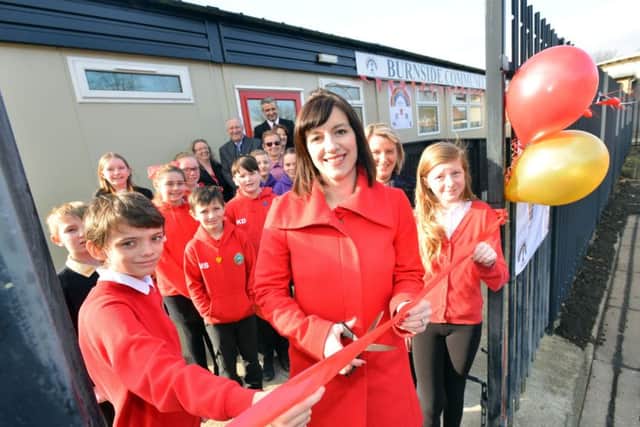 Briget Philipson MP opens the Burnside Academy's new community building with head boy and girl Ashton Rivers, 10 and Italia Naisbitt, 11
