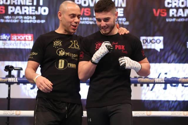 Josh Kelly with trainer Adam Booth.