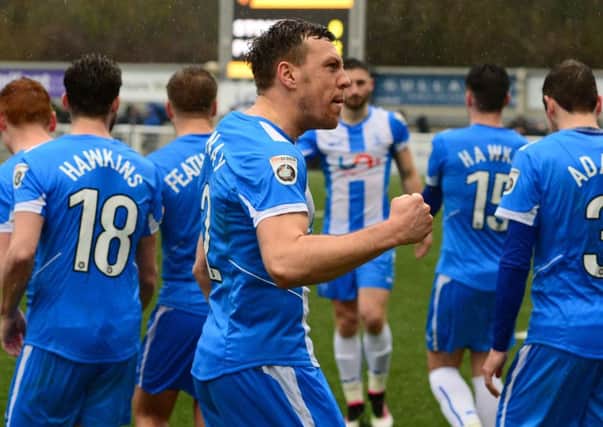 Pools' Carl Magnay celebrates going 2-0 up in yesterday's win at Maidstone. Picture by Howard Roe/AHPIX.com