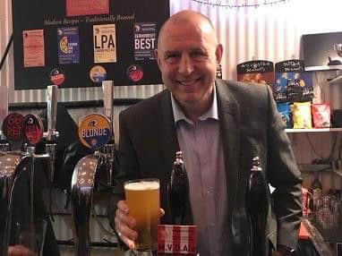 Lee Howey enjoys a pint of the beer named in honour of him.