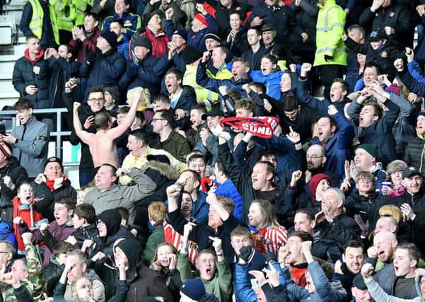 Sunderland fans celebrate the own-goal opener in tonight's win at Derby. Picture by Frank Reid