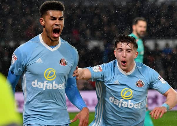 Ashley Fletcher (left) celebrates scoring for Sunderland at Derby, with Lynden Gooch joining the party. Picture by Frank Reid