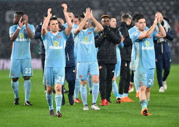 Sunderland's players applaud the travelling fans after last night's win at Derby. Picture by Frank Reid