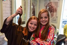Having her hair cut for the Little Princess Trust on Good Friday was 10-year-old Isla McNicholas, by saolon owner Lucy Donnelly at MISSI salon, Rose Street East, Penshaw. Isla is pictured with twin sister Avah.