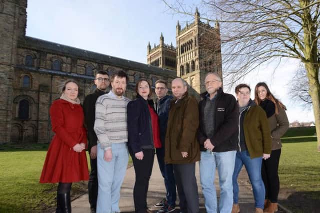 The Woven Bones cast and creative with members of the Durham University team, against the backdrop of Durham Cathedral.