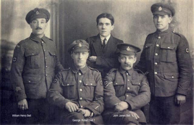 The Bell brothers in their uniforms.