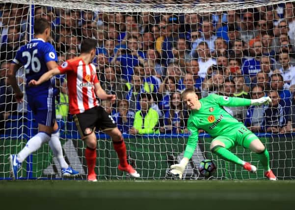 Chelsea's Willian (out of pic) scores his sides first goal past Sunderland keeper Jordan Pickford during the Premier League match at Stamford Bridge in May, 2017.