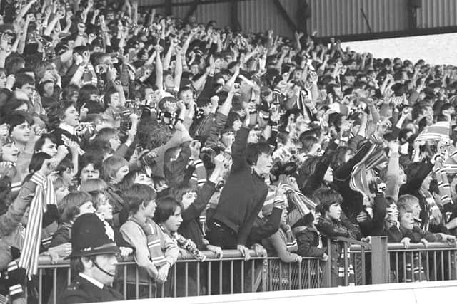 Sunderland fans in the Fulwell End celebrate going ahead against Newcastle in 1980.