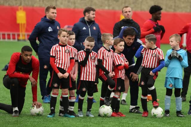 Sunderland boss Chris Coleman gives advice to the Black Cats' new intake of Under-9s.