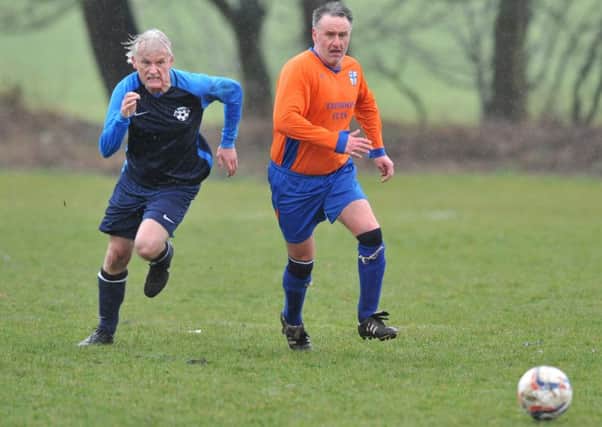 Over-40s action as Doxy Lad (navy) take on Trimdon Vets last weekend. Picture by Tim Richardson