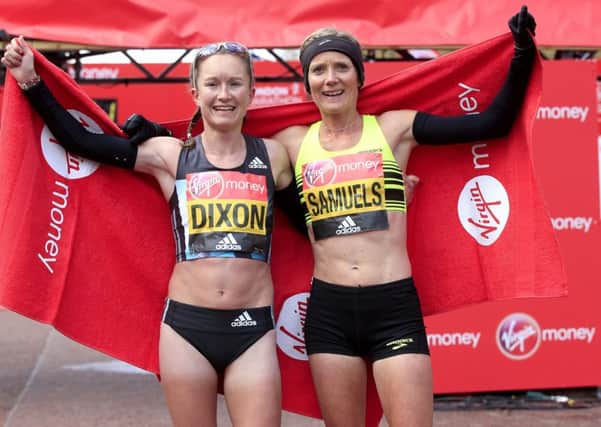Great Britains Alyson Dixon (Sunderland Strollers) and Sonia Samuels celebrate after finishing the 2016 Virgin Money London Marathon.