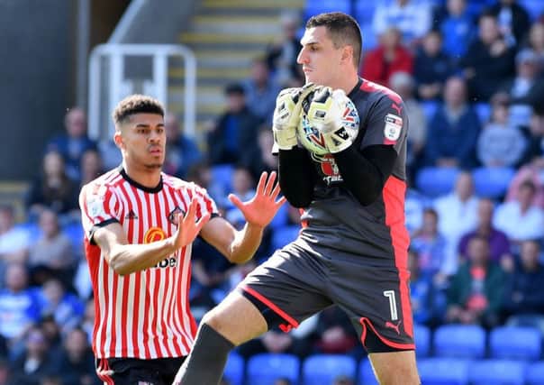 Vito Mannone in action for Reading against Sunderland.
