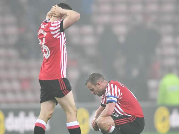 George Honeyman and Lee Cattermole at the end of the game.
