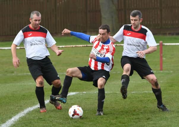 Ryhope Foresters (red/white) take on Redhouse WMC last weekend. Picture by Kevin Brady