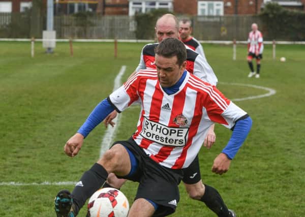 Over-40s action as Ryhope Foresters (red/white) take on Redhouse WMC last week. Picture by Kevin Brady
